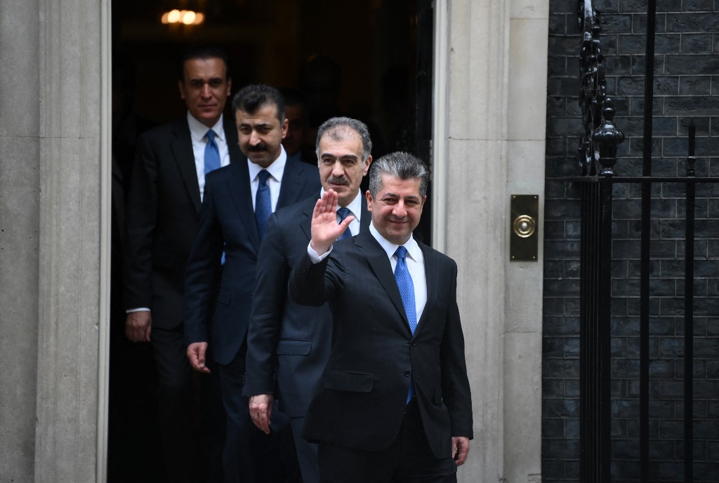 Kurdistan Region Prime Minister Masrour Barzani waves as he leaves 10 Downing Street in central London, April 19, 2022. (Photo: Daniel Leal/AFP)